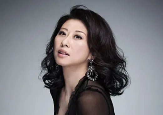 曾经为何心痛变成陌生是什么歌曲？